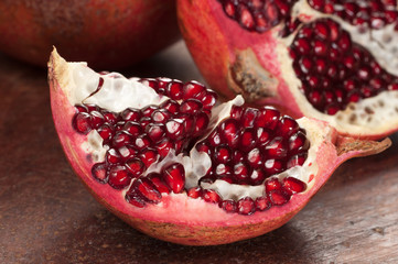 Pomegranate on a timber board