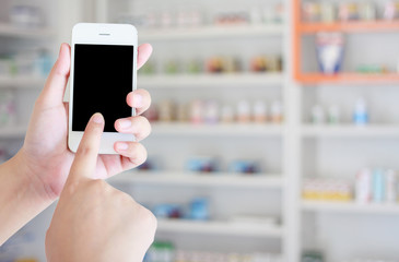 pharmacist hand holding smart phone