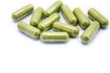 Herbal Drug, an alternative medicine in capsule on white backgro