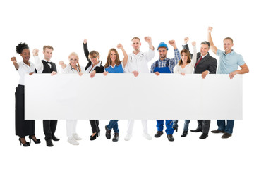 Obraz premium People With Various Occupations Holding Blank Billboard