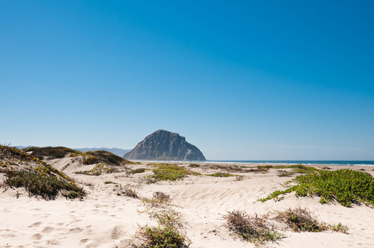 View from dunes to Morro Rock, California, USA