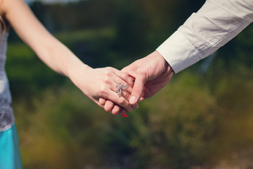 Couple holding hands