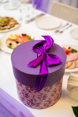 Wedding box with a purple bow