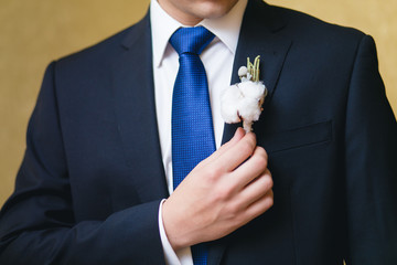Wedding boutonniere on suit