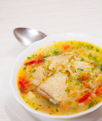 Fish soup with vegetables and rice