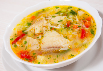 Fish soup with vegetables and rice