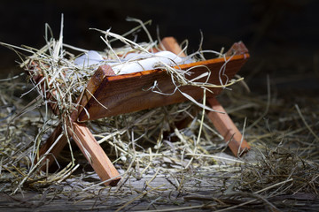 Manger in the stable abstract christmas symbol
