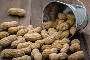 Peanuts on wooden table