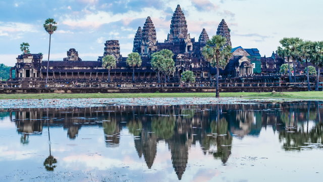 Timelapse of Cambodia landmark Angkor Wat with reflection in water