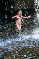 girl playing with water