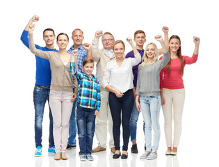 Obraz premium group of happy people showing fists