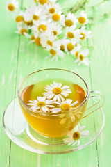 Chamomile tea in glass cup