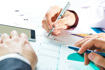 Two businessmen discussing some project