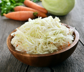 Sauerkraut in wooden bowl