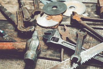 old tools on wooden background
