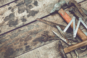 old tools on wooden background
