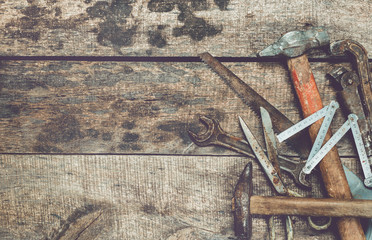old tools on wooden background