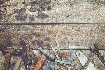old tools on wooden background