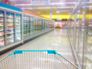 Aisle Milk Yogurt Frozen Food Freezer and Shelves in supermarket - obrazy, fototapety, plakaty