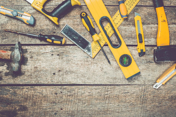 old tools on wooden background