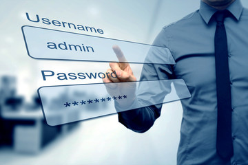 login box - finger pushing username and password fields