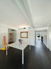 Interior, room with table and artwork