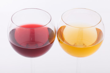 Wine bar, glasses of wine unusual perspective on white background.