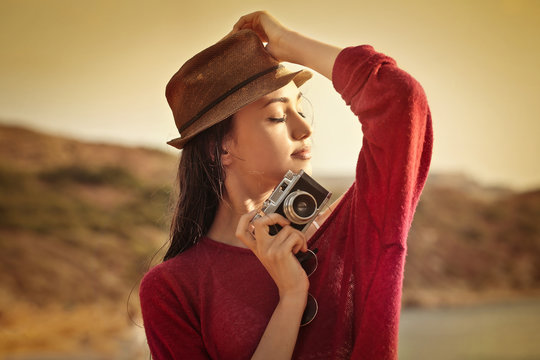 Girl with old-fashioned camera