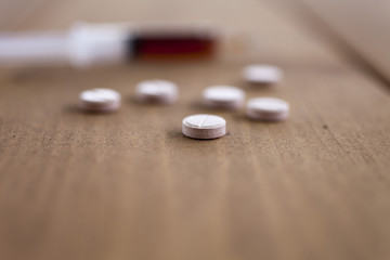 Obraz na płótnie Canvas Pills on a table
