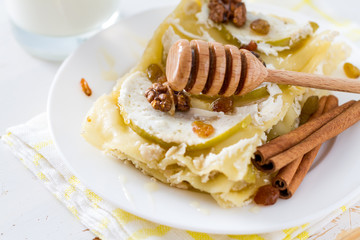 Apple and cottage cheese lasagne, cinnamon and nuts