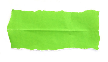 Tear green paper on white background