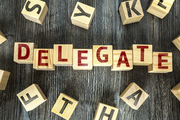 Wooden Blocks with the text: Delegate