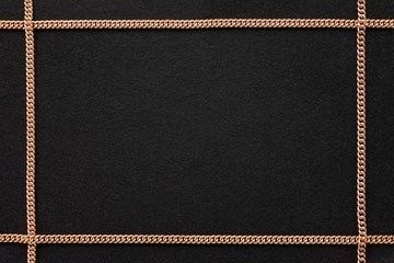 Black background with golden chain