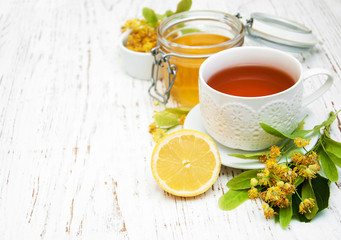 cup of herbal tea with linden flowers