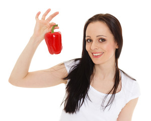 Beautiful young woman with a pepper.