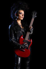 Rock musician in leather clothing isolated