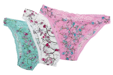 three different female panties isolated on white