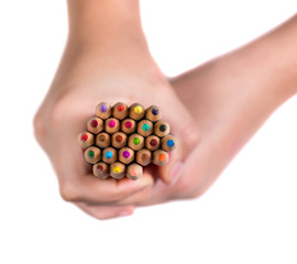 Woman holding colorful pencils