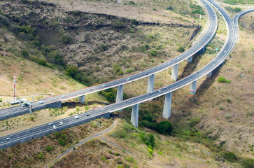 Aerial view to new highway bridge near Saint Paul on Reunion Island, France.