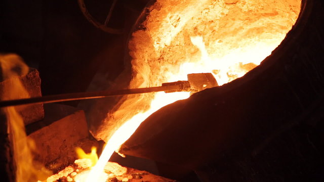 Hot steel pouring at steel plant