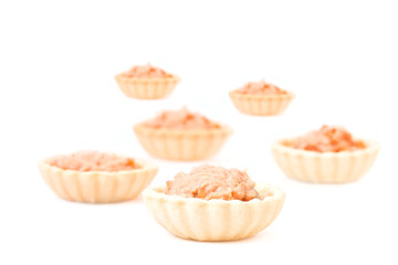 Homemade mini of tuna spread topping.