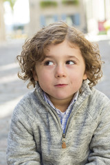 portrait of a boy on a urban background