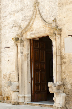 Detail door main entrance Mother Church. Mottola. Puglia. Italy.
