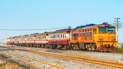 Fototapeta premium Rapid passenger train was passing through station in suburban, 2013.