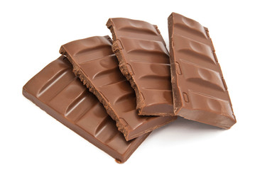 four slices of chocolate on white