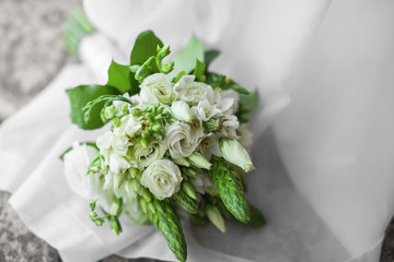 bride holds bouquet