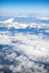 Fototapeta na wymiar sky and Clouds looking from the Airplane