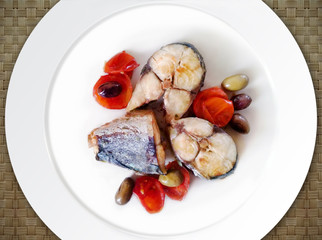Blue fish cooked in a pan.