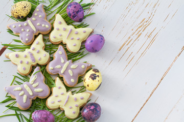 Easter cookies and eggs with grass
