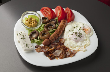 Breakfast served on a white plate